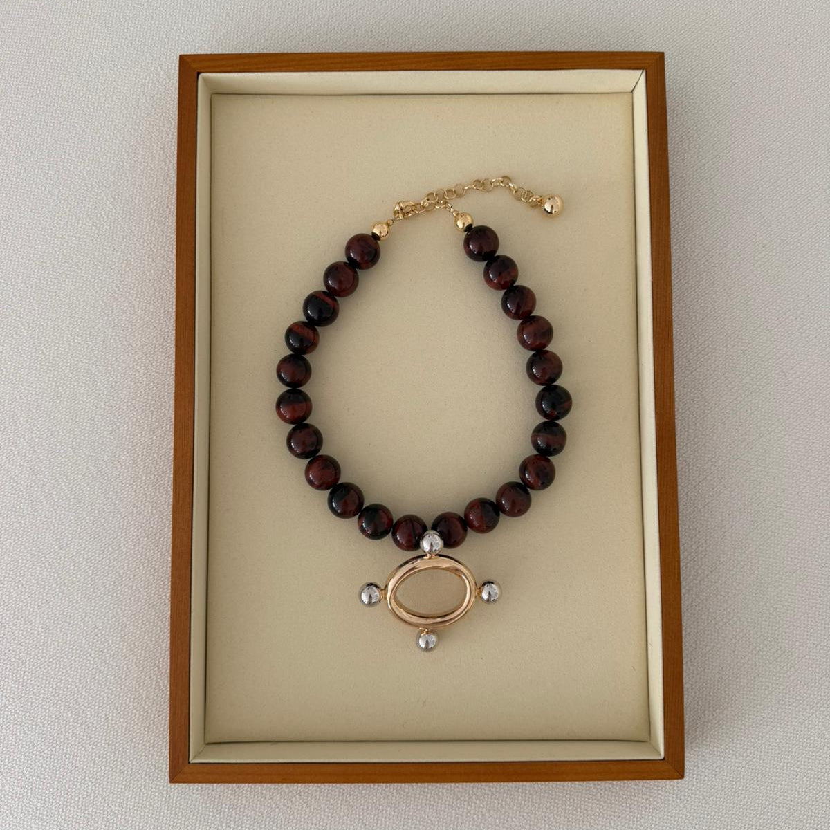 SERAPHINE TWO TONE STATEMENT NECKLACE - RED TIGER EYE